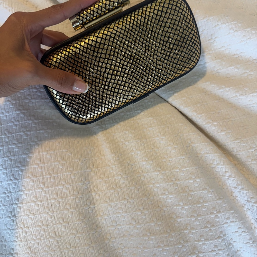 Guess by Marciano Metallic Gold and Black Clutch